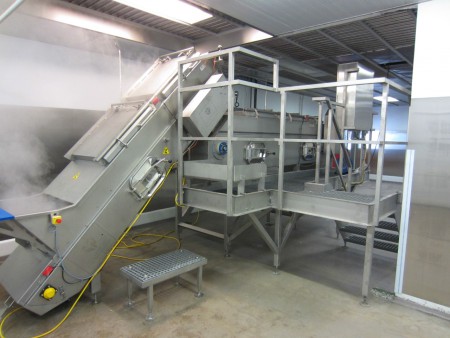 Constructiewerk: installeren van aardappel stoofmachine